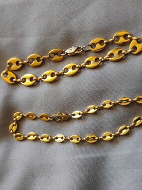 Gold Colored Bracelet And Anklet